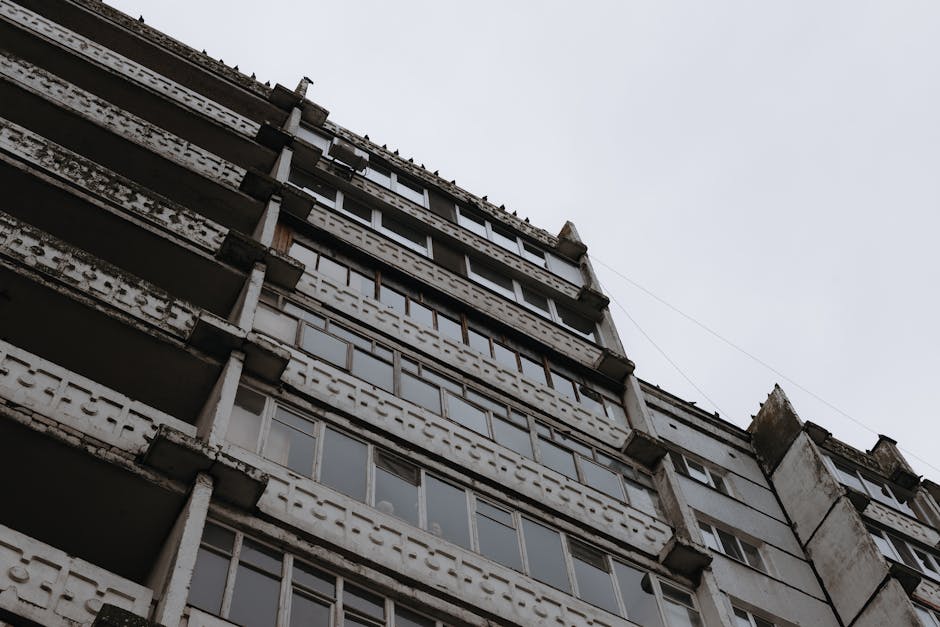 High-rise abandoned building showing urban decay and neglect.